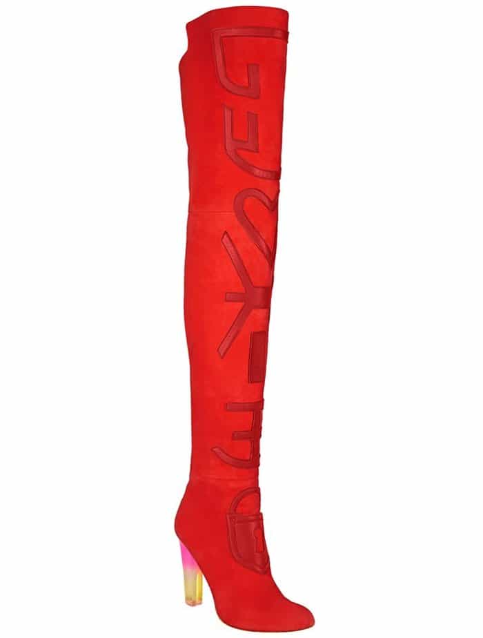 A clean product-style view emphasizes the boots&rsquo; elongated proportions, graphic surface detailing, and architectural heel design