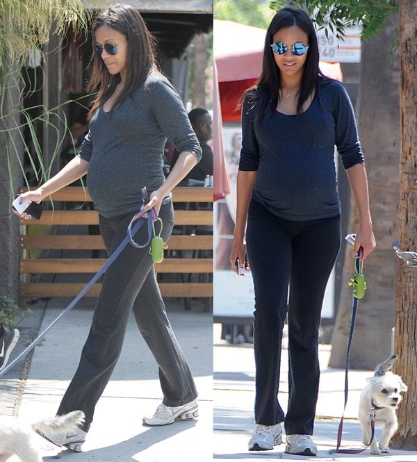 Zoe Salda&ntilde;a walking her dog in a pair of worn-in Nike running shoes